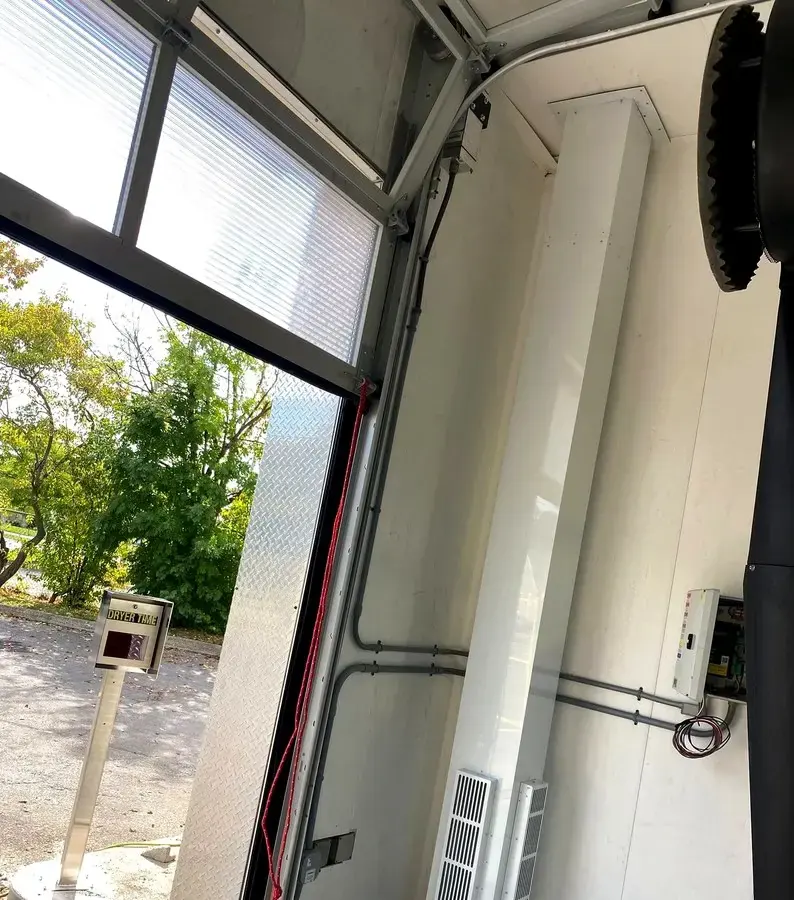 New HVAC ductwork installed at a Hamilton commercial car wash, replacing corroded equipment
