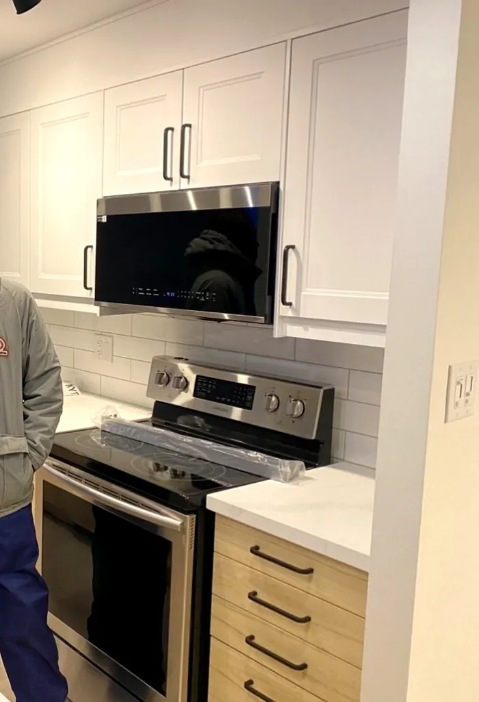 Kitchen sink, window and cabinetry in a completed Hamilton kitchen renovation