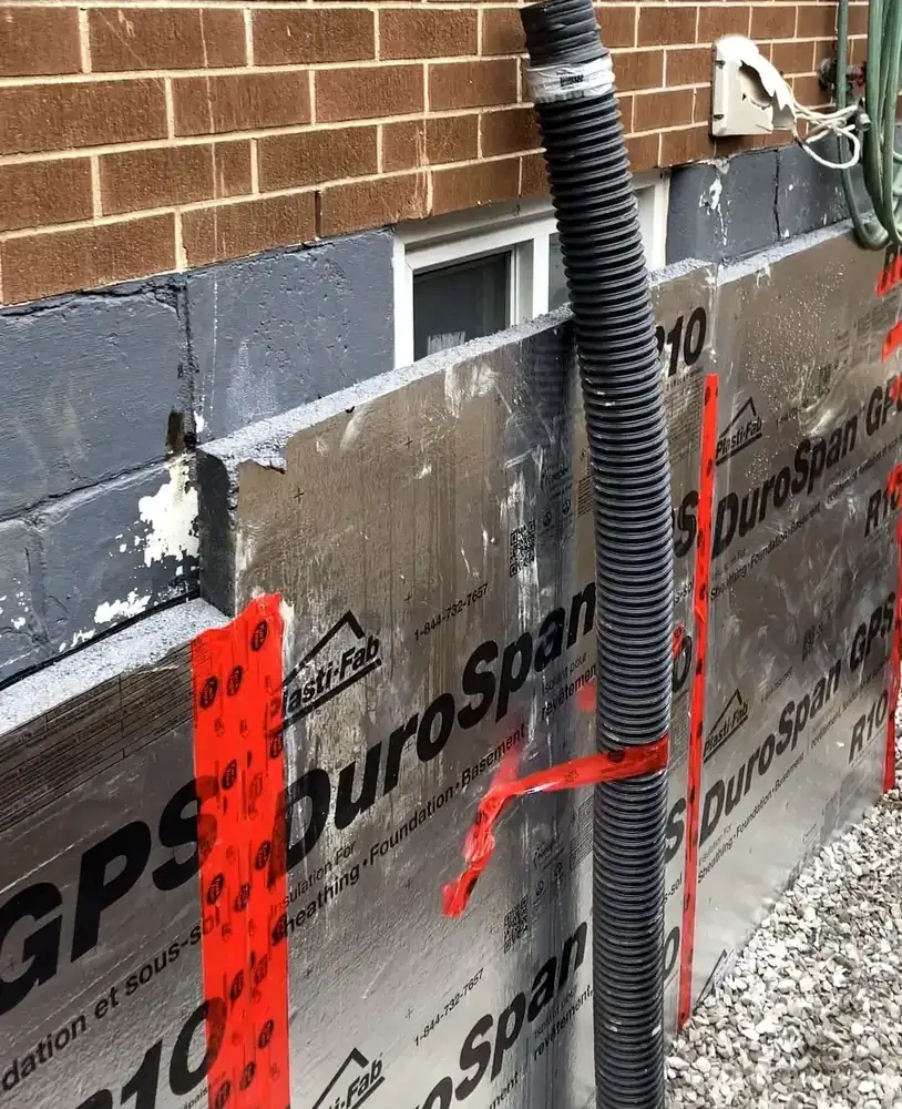 Close-up of DuroSpan insulation and drainage membrane panel installed on a Hamilton foundation wall